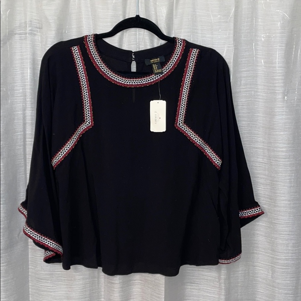 Cute black blouse.